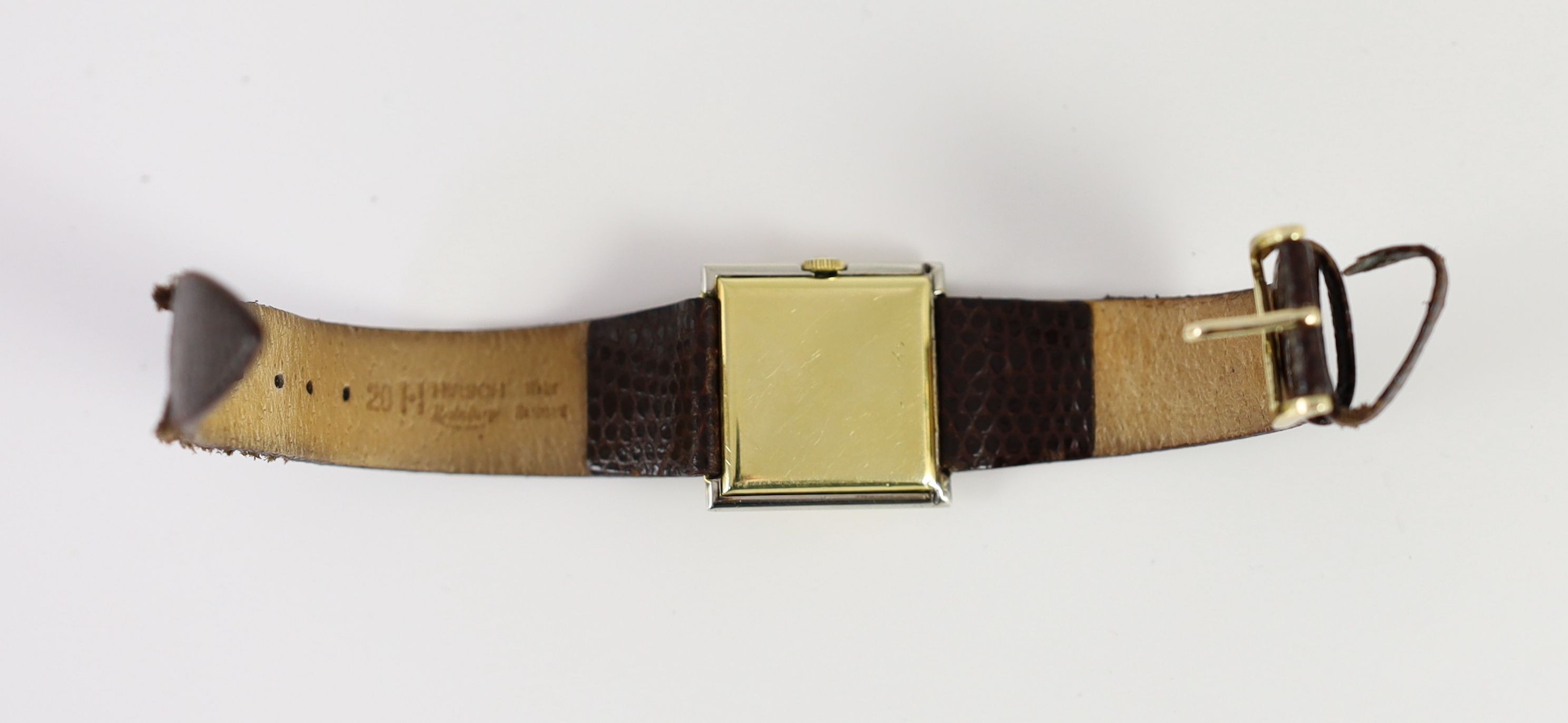 An Art Deco 18ct gold and platinum Longines manual wind square dial wrist watch